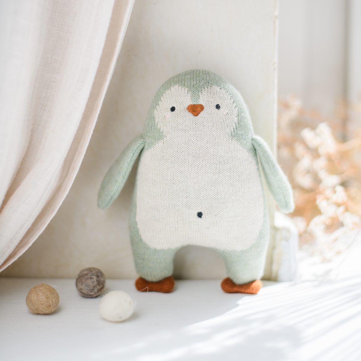 Babyrassel Pinguin Strick