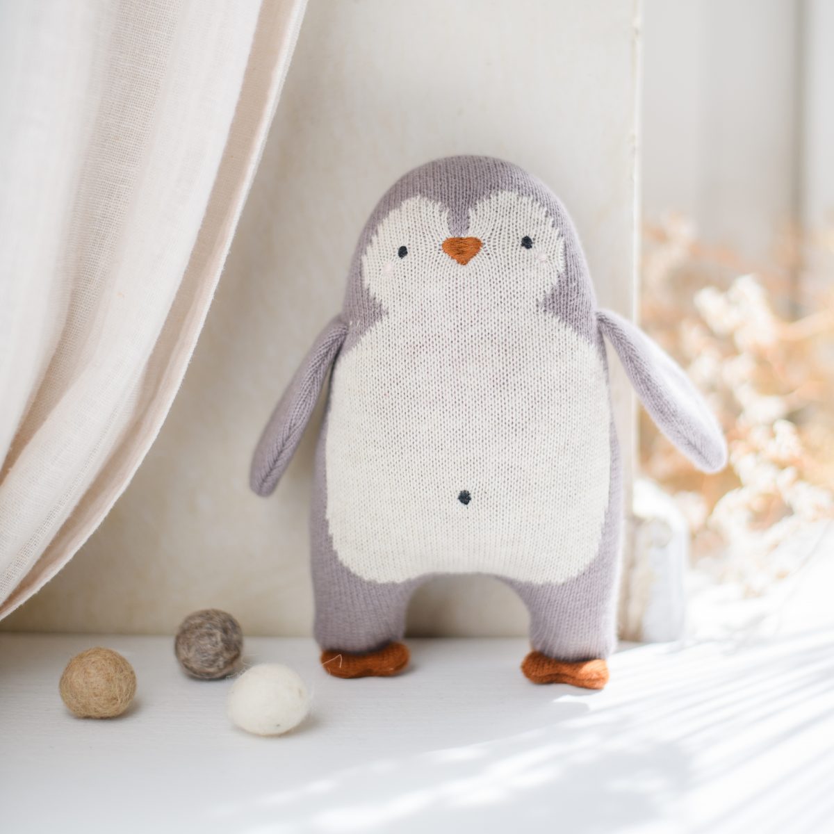 Babyrassel Pinguin Strick