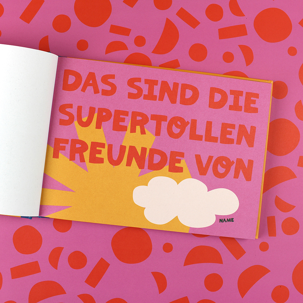 Open pink children’s book page with bold red German title, a white cloud, and a yellow sunburst on a bright pink patterned background; includes a small NAME field.