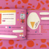 Open children's activity book page on pink background with German prompts and playful illustrations.