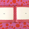 Open scrapbook with pink checkerboard pages; blue flower stickers read 'Best Friends Forever' on each page.