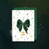 2379grusskarteb6schleifegruen Avayves Feine Papeterie Und Geschenke Für Babys Und Kids White gift card featuring a large dark green bow and multicolored confetti, with the German text 'FÜR DICH' on the front.