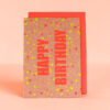 Brown kraft gift box with bold coral 'HAPPY BIRTHDAY' text and neon confetti on a peach background.