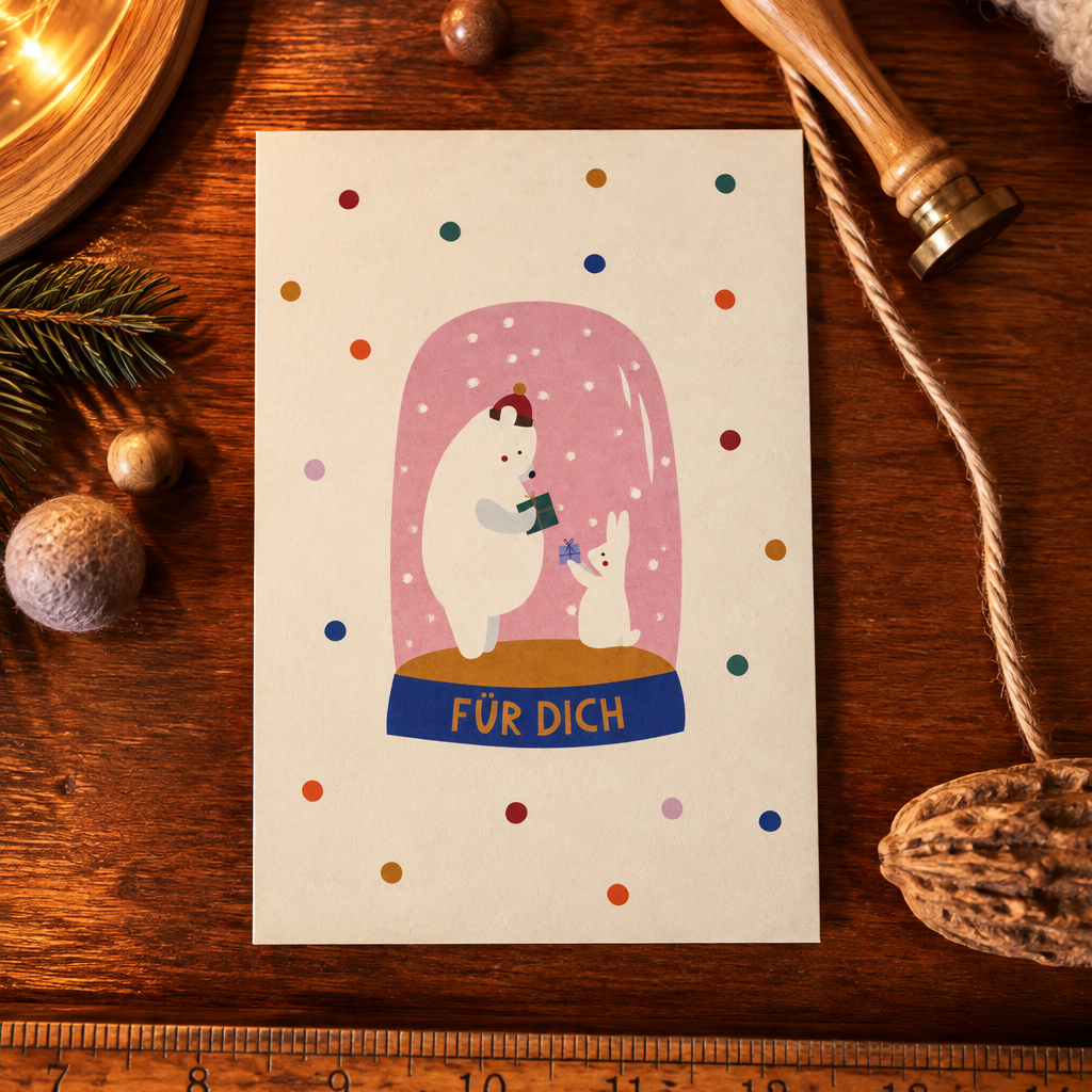 1296pkschneekugelbaerbunt Avayves Feine Papeterie Und Geschenke Für Babys Und Kids Card featuring a white bear and a bunny inside a pink snow globe with 'FÜR DICH' on a blue pedestal, festive confetti around.